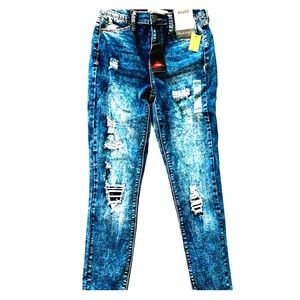 Ripped acid washed jeans.